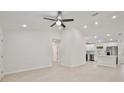 Bright and airy living room with high ceilings and tile flooring at 40210 Orange Cir, Lady Lake, FL 32159