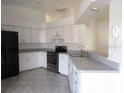 Modern kitchen with stainless steel appliances and ample counter space at 7558 Sw 103Rd Loop, Ocala, FL 34476