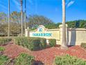 Community entrance sign for Tamarron with lush landscaping at 9397 Se 124Th Pl, Summerfield, FL 34491