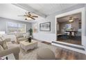 Spacious living room with a view into the dining area at 1333 Lakeview Dr, Clermont, FL 34711