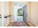 Open entryway with tiled floors and a view to the backyard at 16904 Se 110Th Court Rd, Summerfield, FL 34491