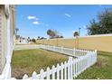 Small backyard with white picket fence at 5415 Kate Ct, The Villages, FL 32163