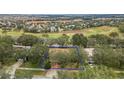 Aerial view showing a single-Gathering house and surrounding neighborhood at 791 Princeton Dr, Clermont, FL 34711