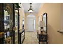 Bright and spacious entryway with tile flooring and decorative accents at 848 Folsum Pl, The Villages, FL 32162