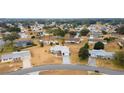 Aerial view of single Gathering home in residential neighborhood at 10476 Se 178Th St, Summerfield, FL 34491