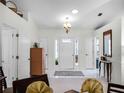 Bright and spacious entryway with high ceilings and neutral colors at 27039 Racquet Cir, Leesburg, FL 34748