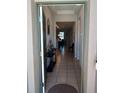 Bright and spacious entryway with tile flooring and views into the main living areas at 37030 Lake Overlook Dr, Grand Island, FL 32735