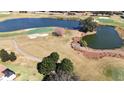 Aerial view of golf course and water features at 9059 Se 177Th Grassmere St, The Villages, FL 32162