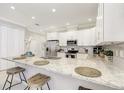 Modern kitchen with stainless steel appliances and granite countertops at 2029 Sloans Outlook Dr, Groveland, FL 34736