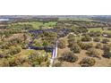 Expansive aerial view highlighting the property lines of this lovely parcel of land at 3380 Cr 528, Sumterville, FL 33585
