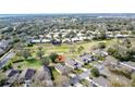 Bird's-eye view of the house and its surroundings, highlighting the location within a residential community at 3916 Doune Way, Clermont, FL 34711