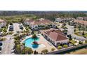 Aerial view of West Lucaya community pool and townhomes at 8988 Silver Pl, Kissimmee, FL 34747