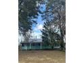 House with a large yard and mature trees at 13369 Cr 719, Webster, FL 33597