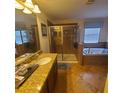 Main bathroom with granite vanity, large shower, and garden tub at 2287 Victoria Dr, Davenport, FL 33837