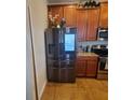 Stainless steel smart refrigerator in a well-lit kitchen at 2287 Victoria Dr, Davenport, FL 33837