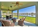 Relaxing screened porch overlooking a lake at 113 Pecorri Ct, Auburndale, FL 33823