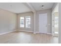 Bright and spacious living room with hardwood floors and lots of natural light at 14261 Crest Palm Ave, Windermere, FL 34786