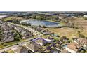 Gorgeous community with a large pond nearby, close to town and features a peaceful location at 2455 Hastings Blvd, Clermont, FL 34711