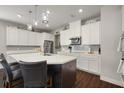 Bright kitchen features a large island with seating, perfect for entertaining and preparing food at 2455 Hastings Blvd, Clermont, FL 34711
