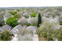 A peaceful community of homes surrounded by mature trees at 3847 Eversholt St, Clermont, FL 34711