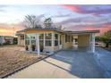 Beautiful home featuring a carport and drought-resistant landscaping, perfect for low-maintenance living at 2714 Vindale Rd, Tavares, FL 32778
