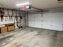 Spacious two car garage interior view with ample room for parking and storage at 2726 Lakewood Ln, Eustis, FL 32726