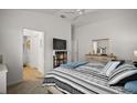 This lovely bedroom is spacious with easy access to the bathroom and closet at 2866 Judah St, The Villages, FL 32163