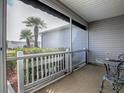 Relaxing screened patio with nice outdoor view, seating, and room for entertaining at 1377 Eagle Ridge Dr, The Villages, FL 32162