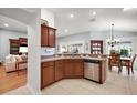Well-equipped kitchen featuring stainless steel appliances and eat in breakfast nook at 2212 Bachman Path, The Villages, FL 32162
