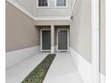 Charming townhome with a well-kept front entrance and dual doorways at 255 Blueberry Ln, Davenport, FL 33837