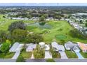 Aerial view of community featuring a beautiful pond and golf course at 511 Bonita Dr, Lady Lake, FL 32159