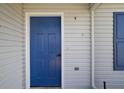 A close up on the blue front door at 2541 Privada Dr, The Villages, FL 32162