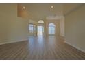 Bright and airy living room with ample natural light, light colored walls and modern flooring at 39100 Tacoma Dr, Lady Lake, FL 32159