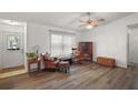 Cozy living room with comfortable seating and natural light at 40619 W 3Rd Ave, Umatilla, FL 32784