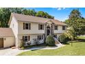 Beautiful two-story home featuring manicured landscaping and inviting curb appeal at 16017 Harbar Oaks Dr, Montverde, FL 34756
