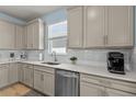 Bright kitchen featuring shaker cabinets, stainless steel appliances and neutral color accents at 17291 Saw Palmetto Ave, Clermont, FL 34714