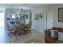Open living space showing living and dining areas flowing into a modern kitchen at 773 Artesia Ave, The Villages, FL 32162