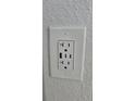 Close-up of an installed electrical wall outlet with USB ports for convenient device charging at 12412 Sw 98Th St, Dunnellon, FL 34432