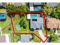 Aerial view of the property, showcasing the pool, fenced yard and proximity to neighboring homes at 342 Lake Amberleigh Dr, Winter Garden, FL 34787