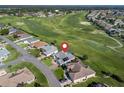 An aerial view of the home showing golf course frontage at 11743 Se 174Th Loop, Summerfield, FL 34491