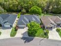 Aerial shot of single Gathering home with well maintained roof and landscaping at 17883 Se 125Th Cir, Summerfield, FL 34491