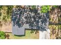 An aerial view of the home showcasing the roof and surrounding landscape at 1107 Valley Rd, Fruitland Park, FL 34731