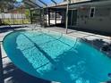 Inviting screened-in pool area, perfect for relaxation and entertaining at 2181 Gretna Dr, Deltona, FL 32738