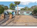 Charming single-story home with a well-maintained yard and inviting curb appeal at 219 N Rossiter St, Mount Dora, FL 32757
