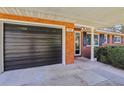 Attached garage with direct entry and brick facade at 231 Cr 482S, Lake Panasoffkee, FL 33538