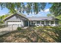 Charming single-story home with a well-maintained lawn at 331 W Lewis Ave, Apopka, FL 32712