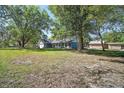 Expansive backyard with a detached garage at 331 W Lewis Ave, Apopka, FL 32712