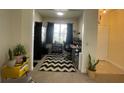 Bright home office with a large window for natural light and ample workspace at 130 Southern Pecan # 105, Winter Garden, FL 34787