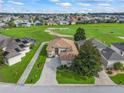 Beautiful aerial view of the home and golf course community at 17769 Se 121St Terrace Rd, Summerfield, FL 34491