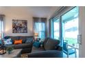 Comfortable seating area with views to the outside patio at 1914 Hux Ct, The Villages, FL 34762